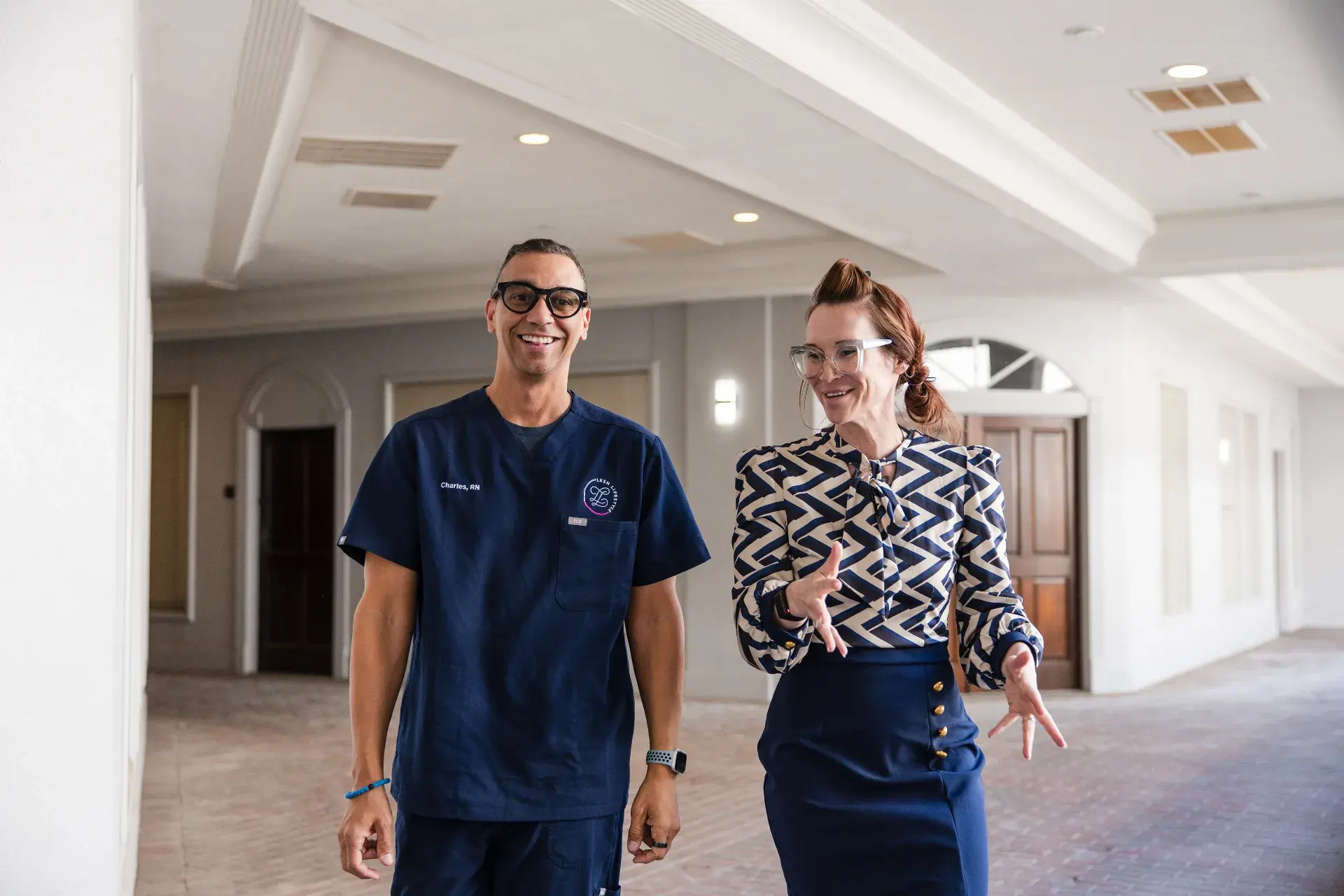 Dr. Sarah Secor-Jones walking with Charles Jones, RN, BSN, at Lesh Lifestyle