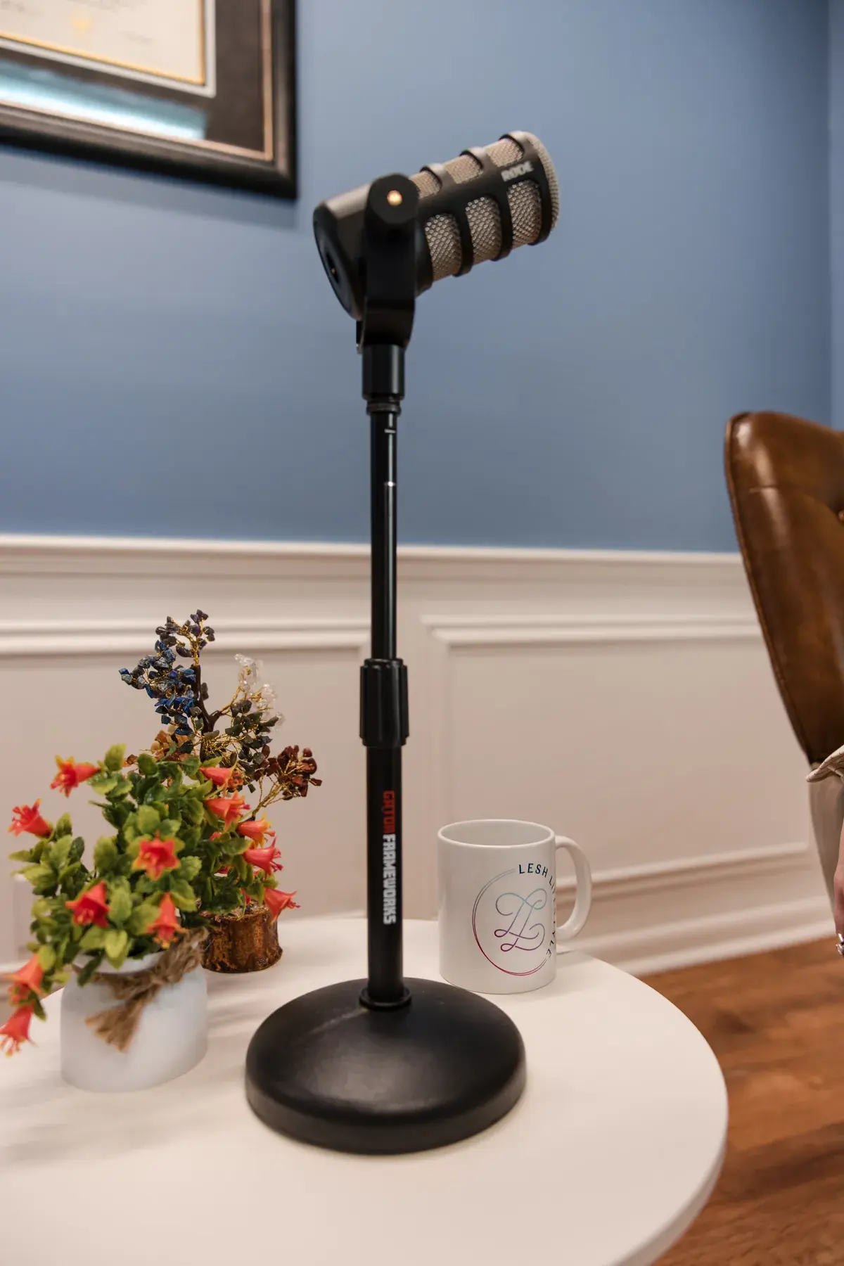 A podcast microphone set up in Dr. Sarah's office at Lesh Lifestyle